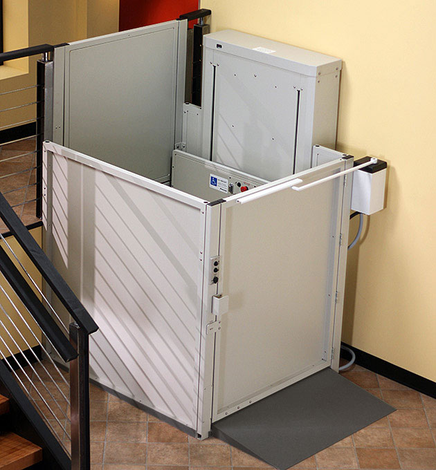 Mac's wheelchair vertical platform porch lift for mobile homes with safety gates, installed by ELECTROPEDIC