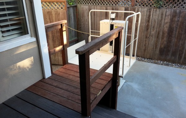Mac's porch lift at a home entry