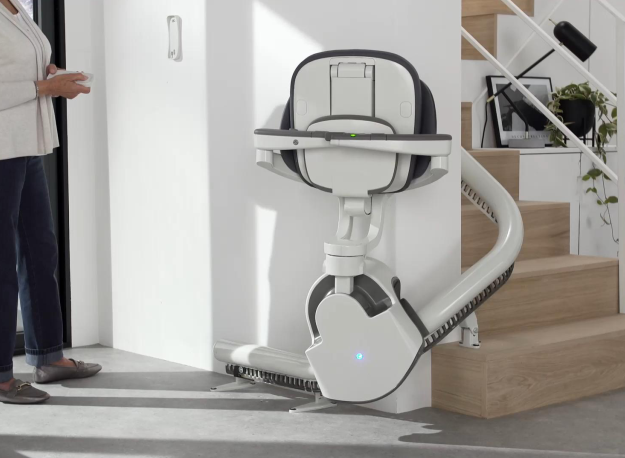 AccessBDD Flow X stair lift professionally installed in a home by ELECTROPEDIC technicians