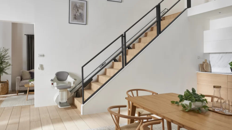 AccessBDD HomeGlide stair lift with automatic folding rail and built-in call device - ELECTROPEDIC