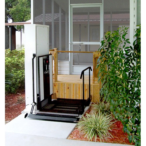 Vertical platform wheelchair porch lift at a home entrance - ELECTROPEDIC